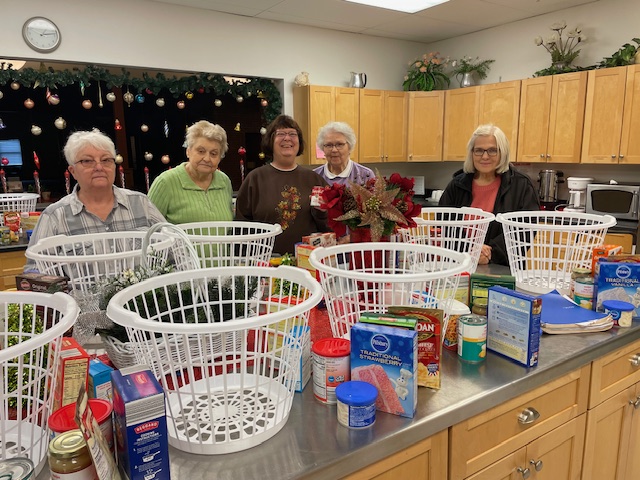 Presbyterian Women creating food baskets